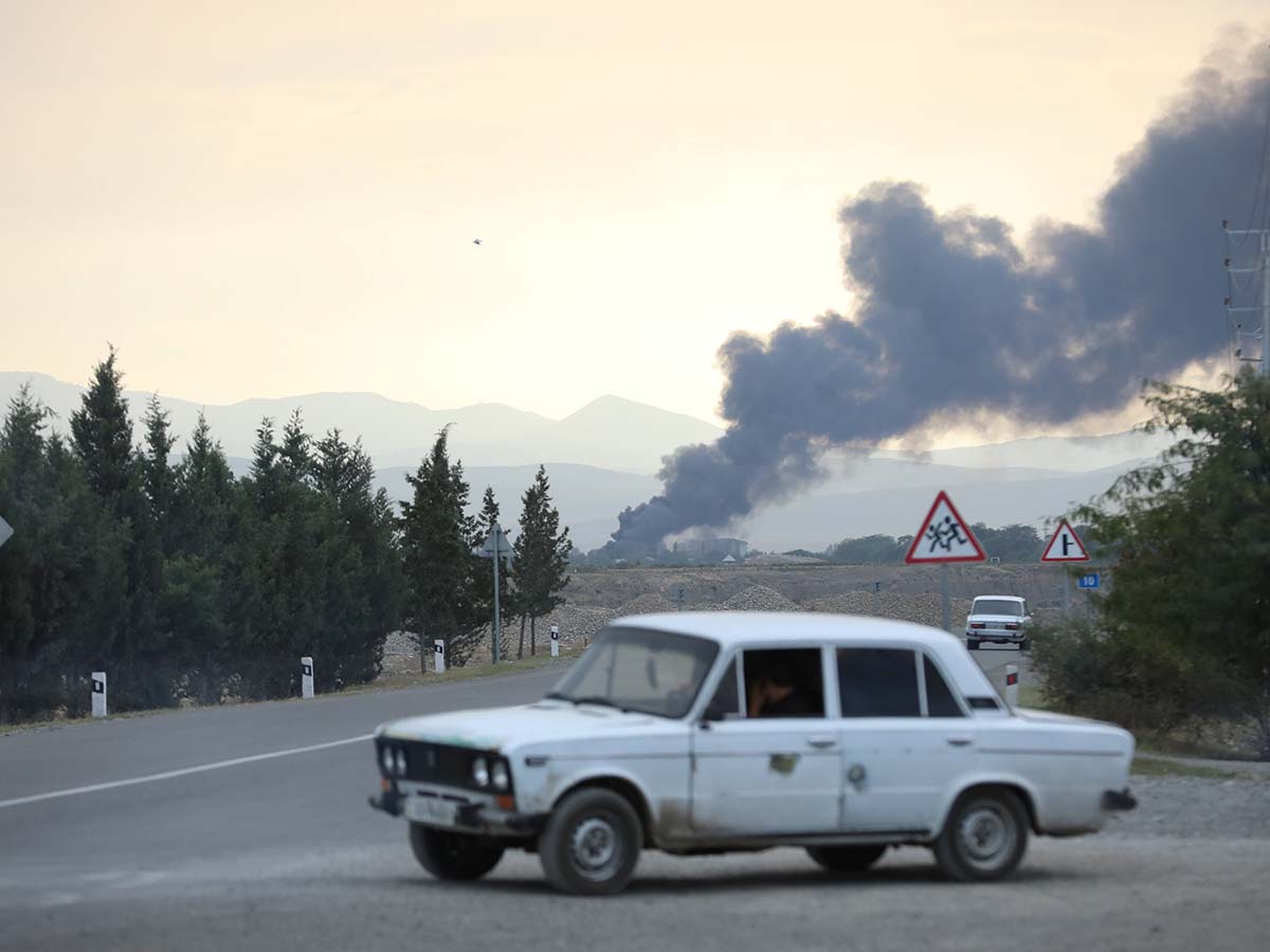 Smoke rises after alleged shelling during a military conflict over the breakaway region of Nagorno-Karabakh, in Terter