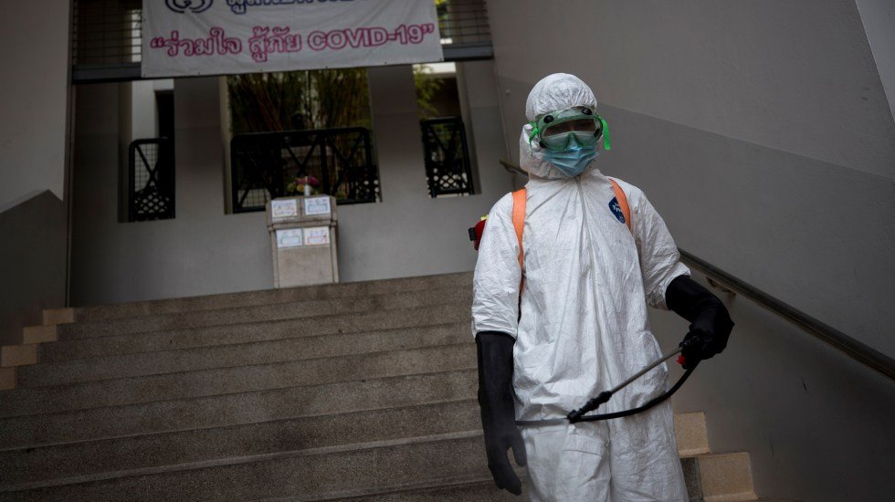 Firefighters disinfect a kindergarten ahead of schools re-opening